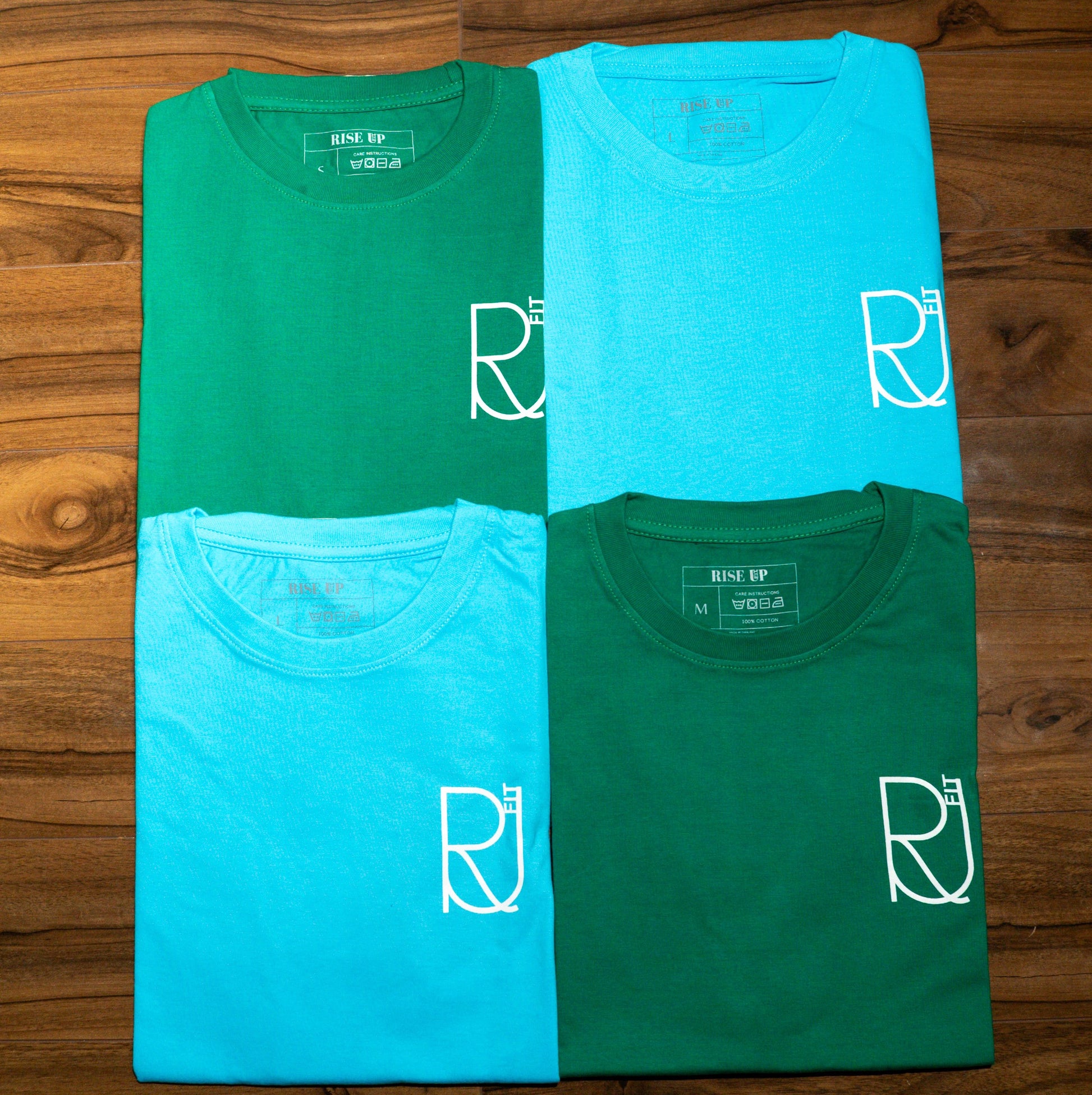 Rise up fit oversized t-shirts in blue and green folded